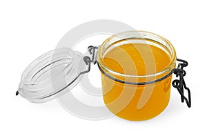 Fresh honey in glass jars photo