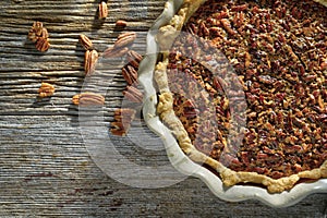 Fresh hot pecan pie served on a rustic table top