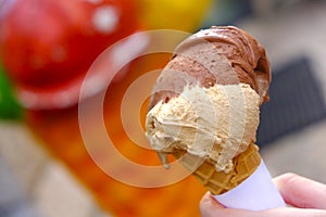 Fresh ice-cream in waffle cone, gelatteria