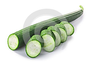 Fresh immature Luffa Luffa acutangula  pepo fruit, partially sliced, isolated w clipping paths