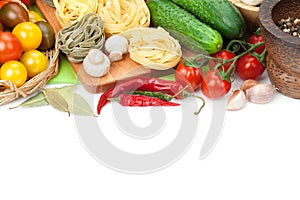 Fresh ingredients for cooking: pasta, tomato, cucumber, mushroom