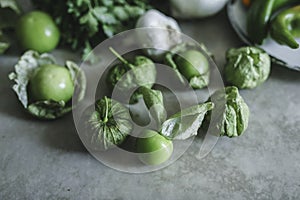 Fresh ingredients for green tomatillos salsa