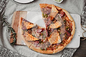 Fresh italian pizza. Food photography for design. Top view photo. Mexican pizza with chips, onion, hot jalapeno pepper