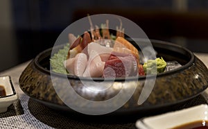 Fresh Japanese seafood platter cuisine on the dining table