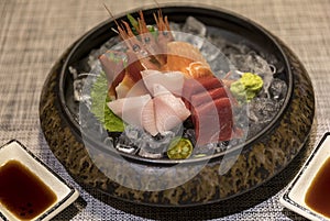 Fresh Japanese seafood platter cuisine on the dining table