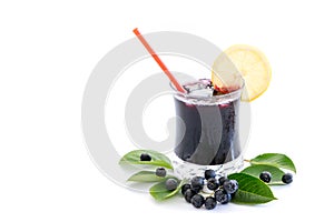 Fresh juice of chokeberry Aronia melanocarpa in glass and berry and leaves near, isolated on white photo