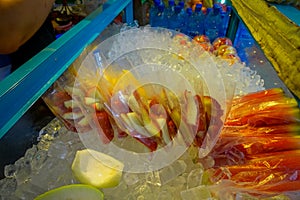 Fresh juice and fruit market stand in downtown Kuala Lumpur