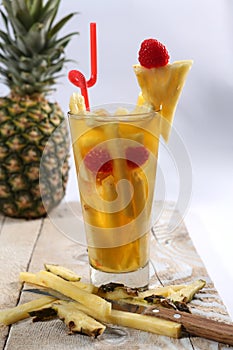 Fresh juice with pineapple slice