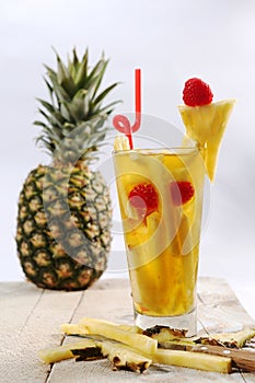 Fresh juice with pineapple slice