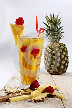 Fresh juice with pineapple slice