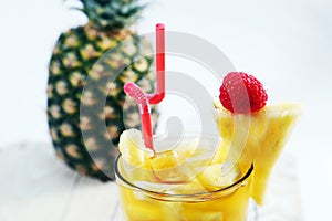 Fresh juice with pineapple slice