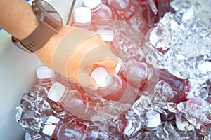 fresh juice in plastic bottles freeeze in ice bucket