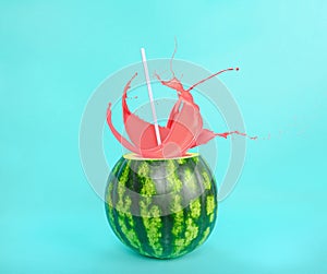 Fresh juice splash exits from a watermelon