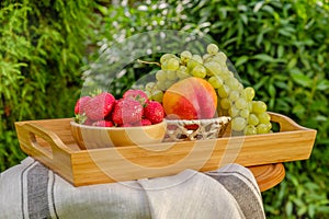 Fresh juicy fruit on the natural background