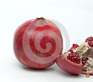 Fresh and juicy granate on white background. Organic food