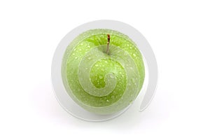 Fresh juicy green apple with water drops