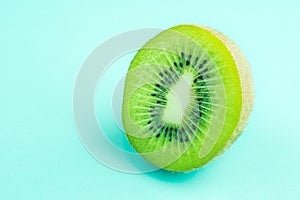 fresh and juicy green kiwi fruit on green pastel colour