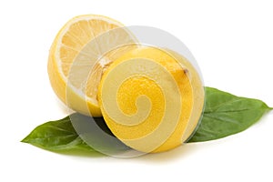 Fresh juicy Lemon with green leafs