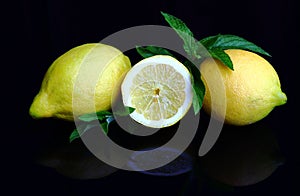 Fresh juicy lemons with peppermint