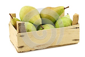 Fresh juicy migo pears in a wooden box