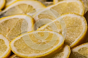 Fresh juicy orange fruit rings close up background.