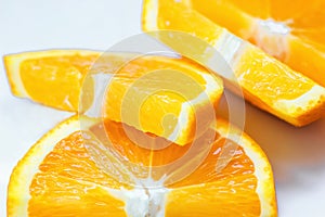 Fresh juicy orange fruit slice isolated. Citrus fruit-natural vitamin C.