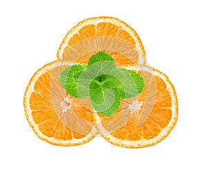 Fresh juicy orange slices and mint herb isolated on white