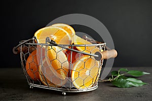 Fresh juicy oranges in basket