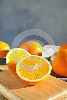 Fresh juicy oranges on wooden