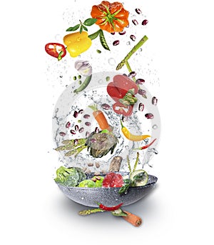Fresh Juicy organic vegetables falling into pan with water splash. Veggy concept