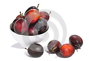 Fresh juicy plum on a white background