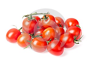 Fresh juicy red cherry tomato bunch closeup isolated on white background.