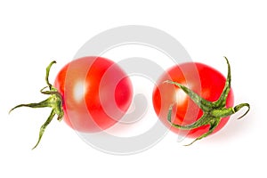 Fresh juicy red cherry tomatoes closeup isolated on white background.
