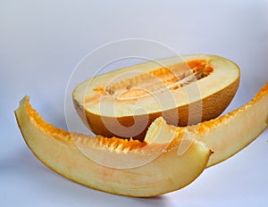 Fresh, juicy ripe melon on a white background