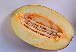 Fresh, juicy ripe melon on a white background