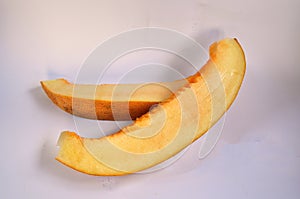 Fresh, juicy ripe melon on a white background