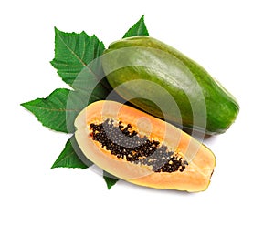 Fresh juicy ripe papayas with leaf on white background