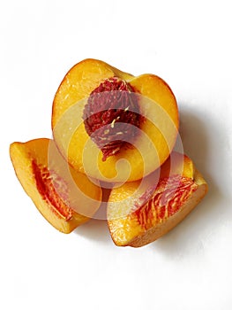 fresh juicy sliced peach on white background