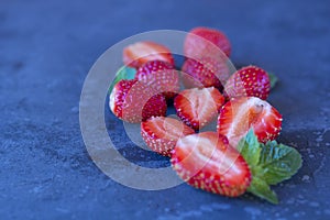 Fresh juicy  strawberry on a dark background