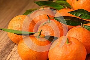 fresh juicy tangerines on a wooden table 12