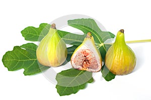 Fresh, juicy and tasty green figs on a leaf