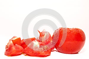 Fresh juicy tomato isolated on white background. Tomatoes with water drops isolated on white background