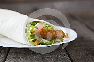 Fresh juicy tortilla wrap with chicken and vegetables