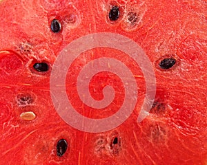 Fresh, juicy watermelon slice top view closeup, organic red fruit