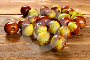 Fresh jujubes on a wooden table