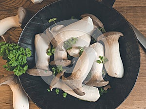 Fresh king oyster mushroom - Pleurotus eryngii in iron pan