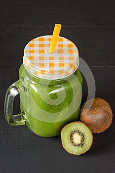 Fresh kiwi fruit smoothie cocktail drink. Food diet concept.