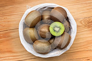 Fresh kiwi fruit in a wicker basket