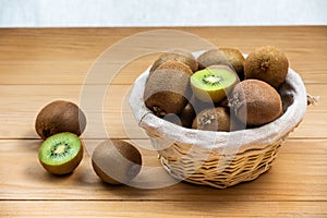 Fresh kiwi fruit in a wicker basket