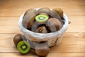 Fresh kiwi fruit in a wickere basket